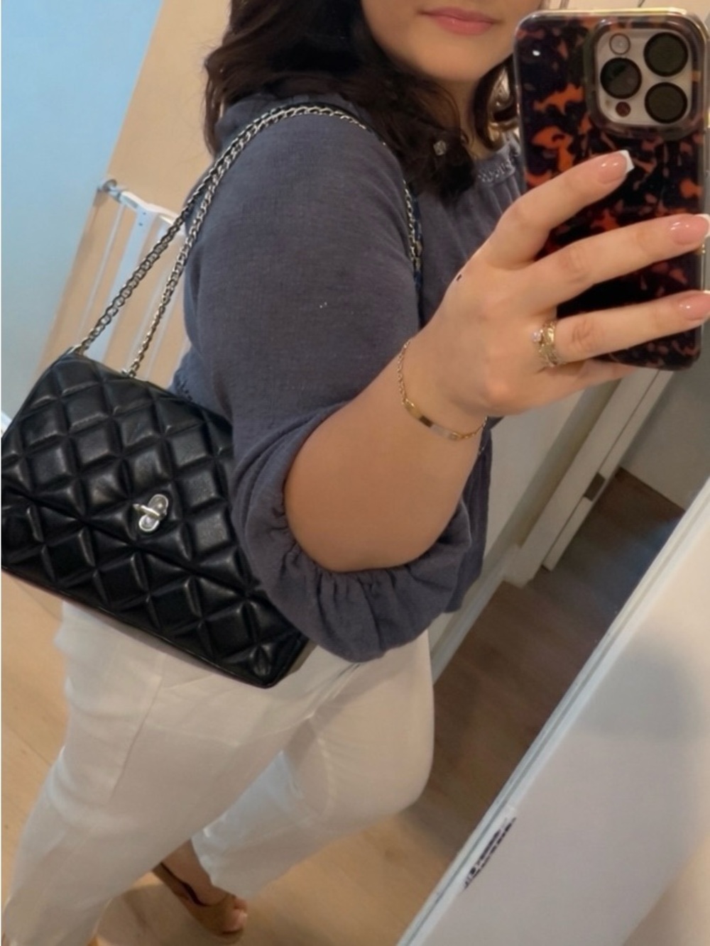 The quilted dual shoulder bag